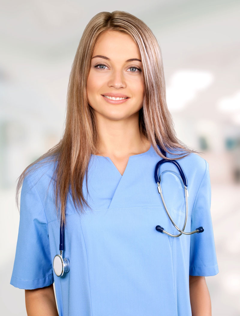 blonde nurse in light blue scrub with stethoscope smiling